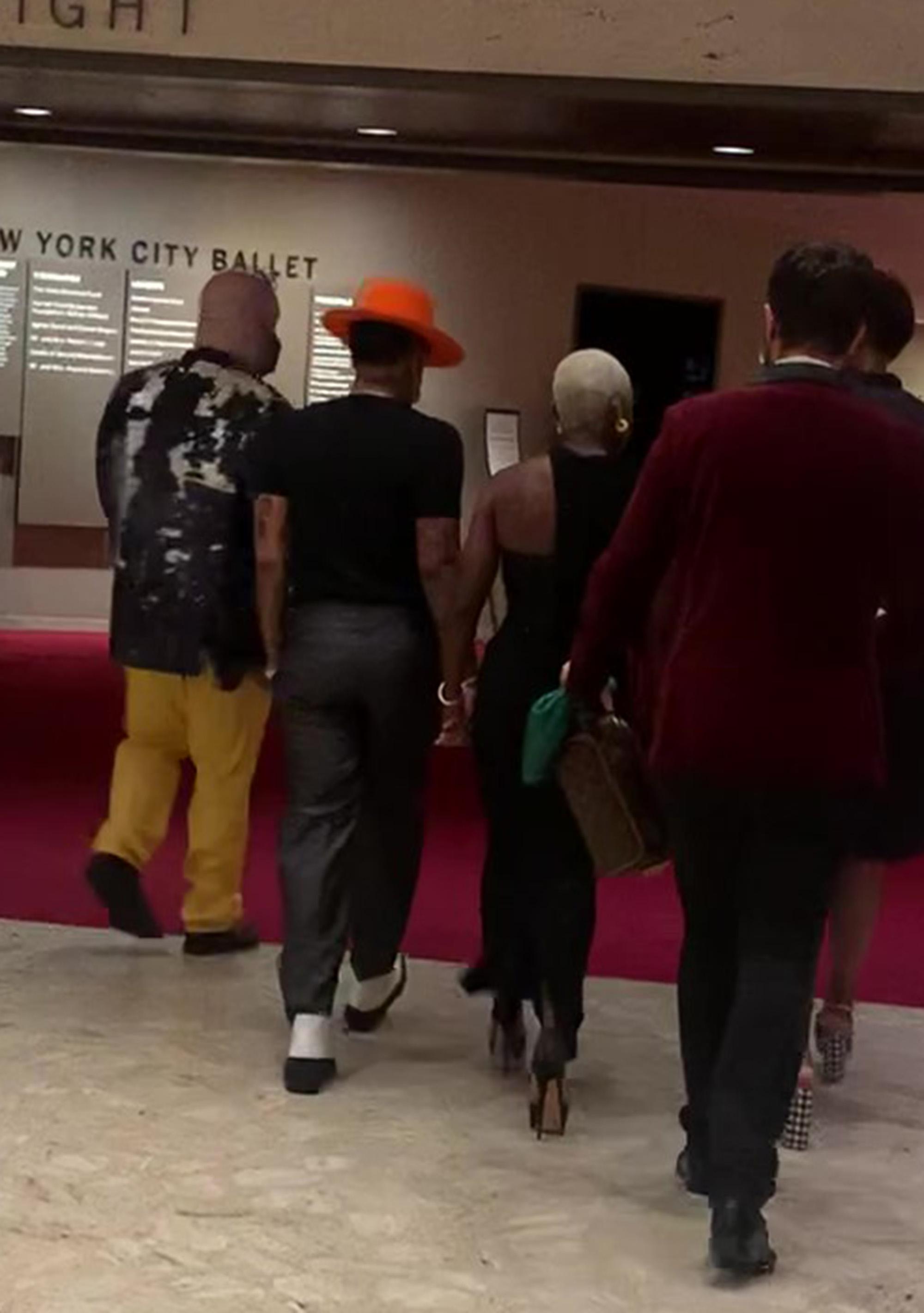 Lena Waithe and Cynthia Erivo holding hands.