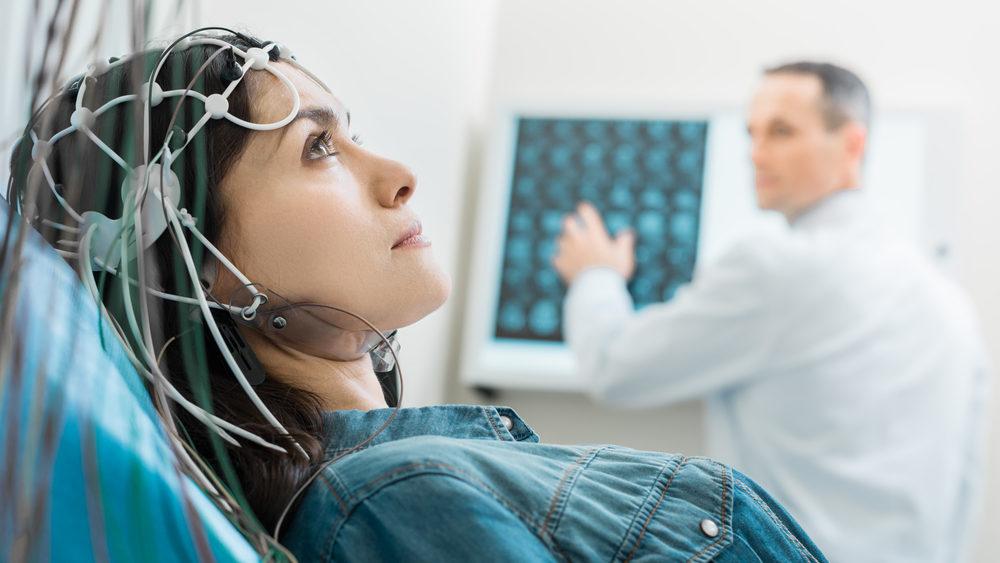 Woman receiving an EEG