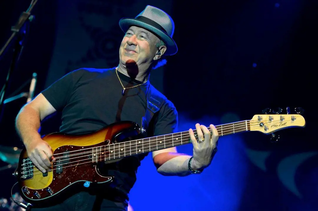 Stu Cook with hat and a electric guitar. He was wished happy birthday in 2014 by Royal music.