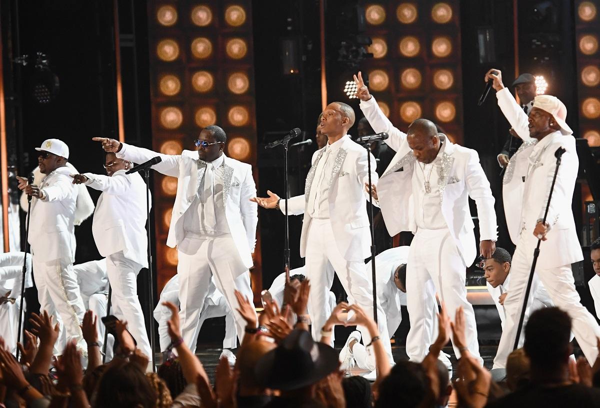 The original members of New Edition performing onstage at the BET Awards