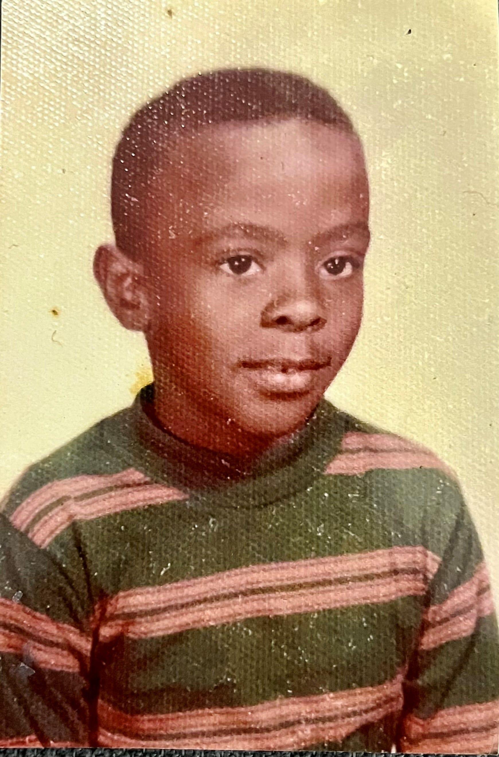 Todd Suttles, 6, as a first grader growing up in a farm town in northern Georgia