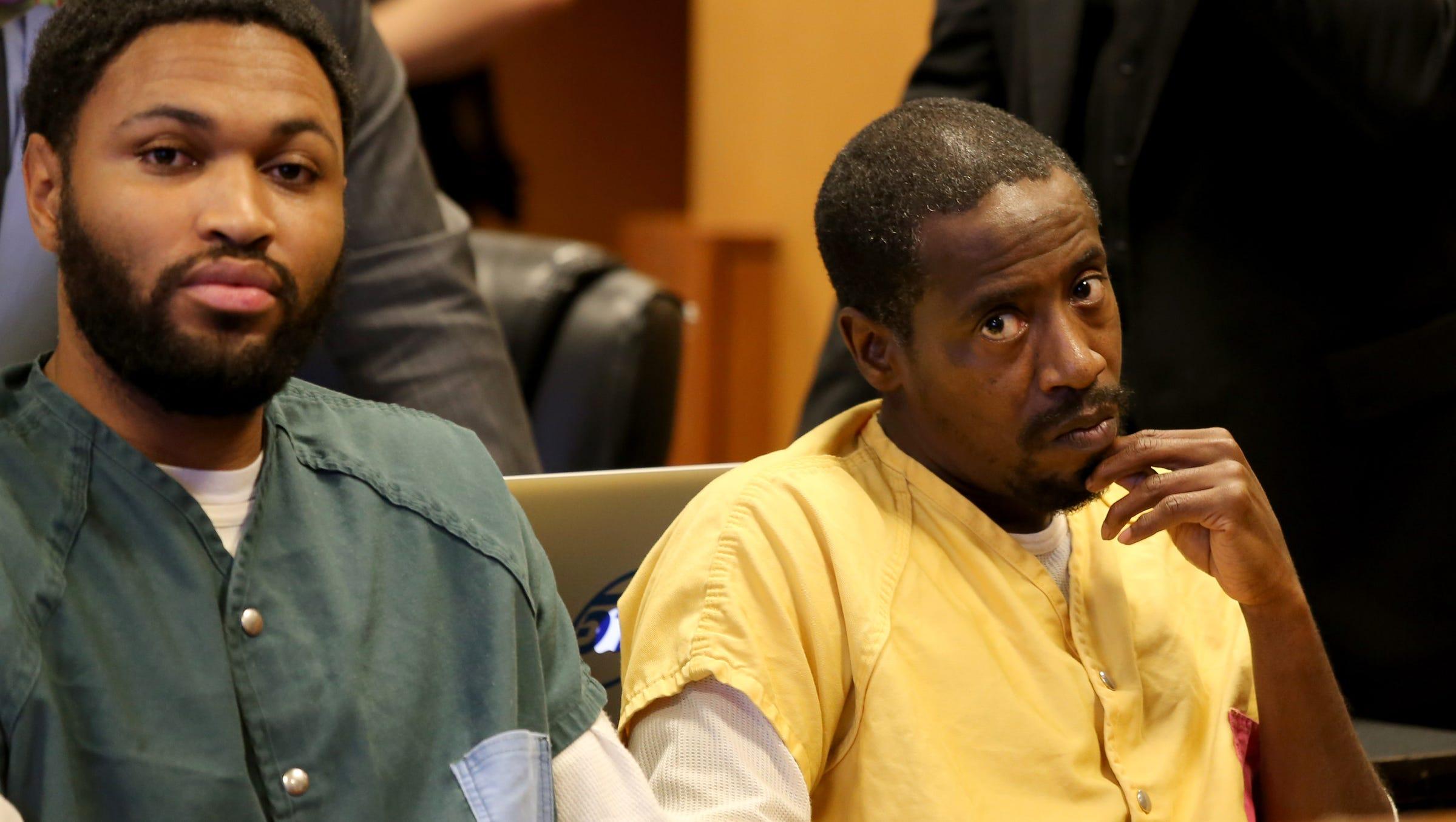 Dietrick Odums, left, and Otis Davis, sit in court Friday, Oct. 13, 2015, at their preliminary examination in the killing of rapper Dex Osama.