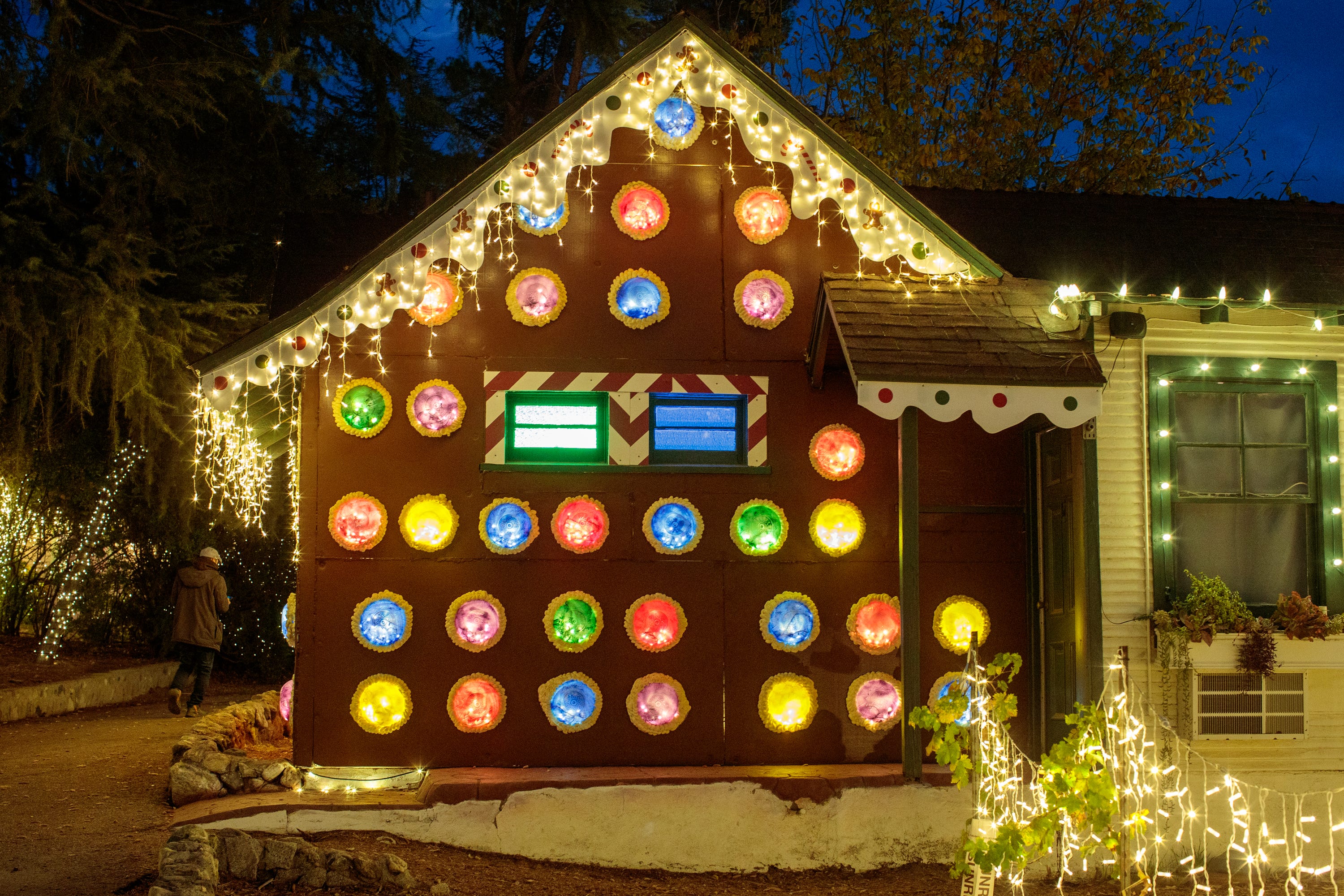 Buildings are decorated during the Christmas Nights festival at 123 Farm in Beaumont, Calif., on Monday, Dec. 5, 2022.