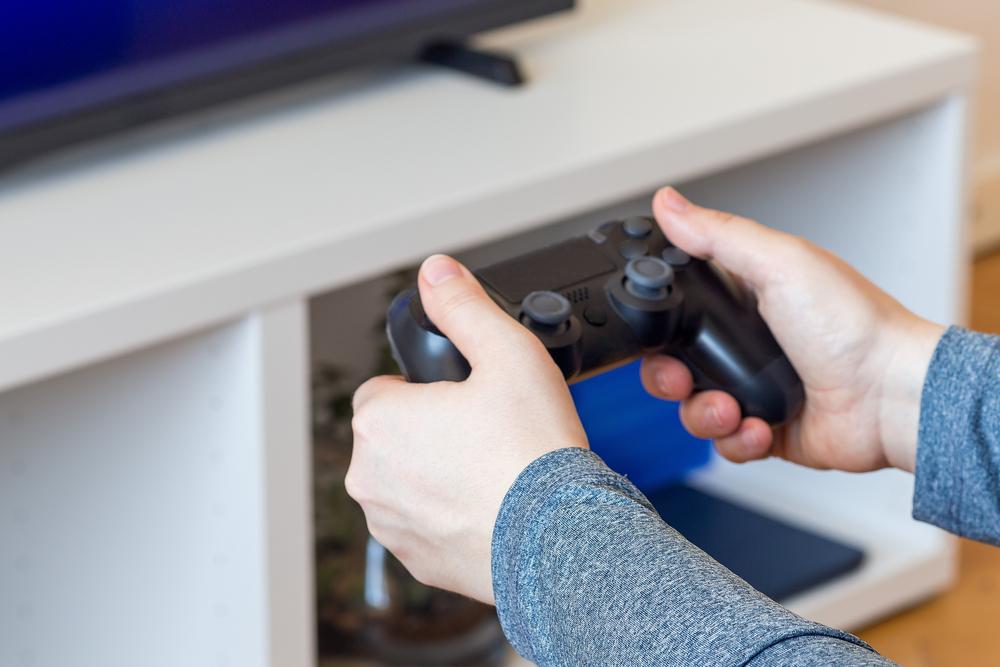 Woman hands with a game controller,