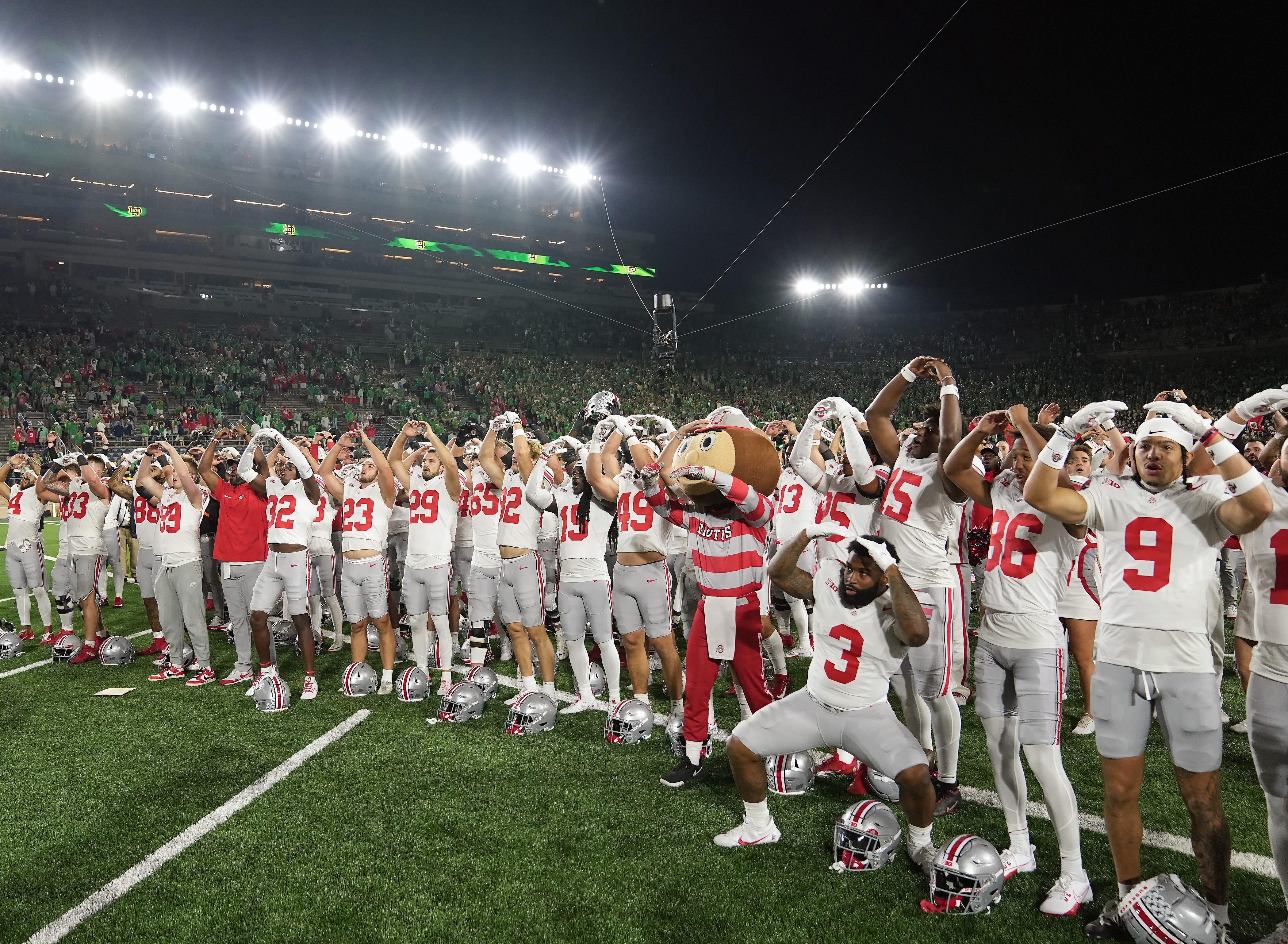 Ohio State players sing "Carmen Ohio" after beating Notre Dame.