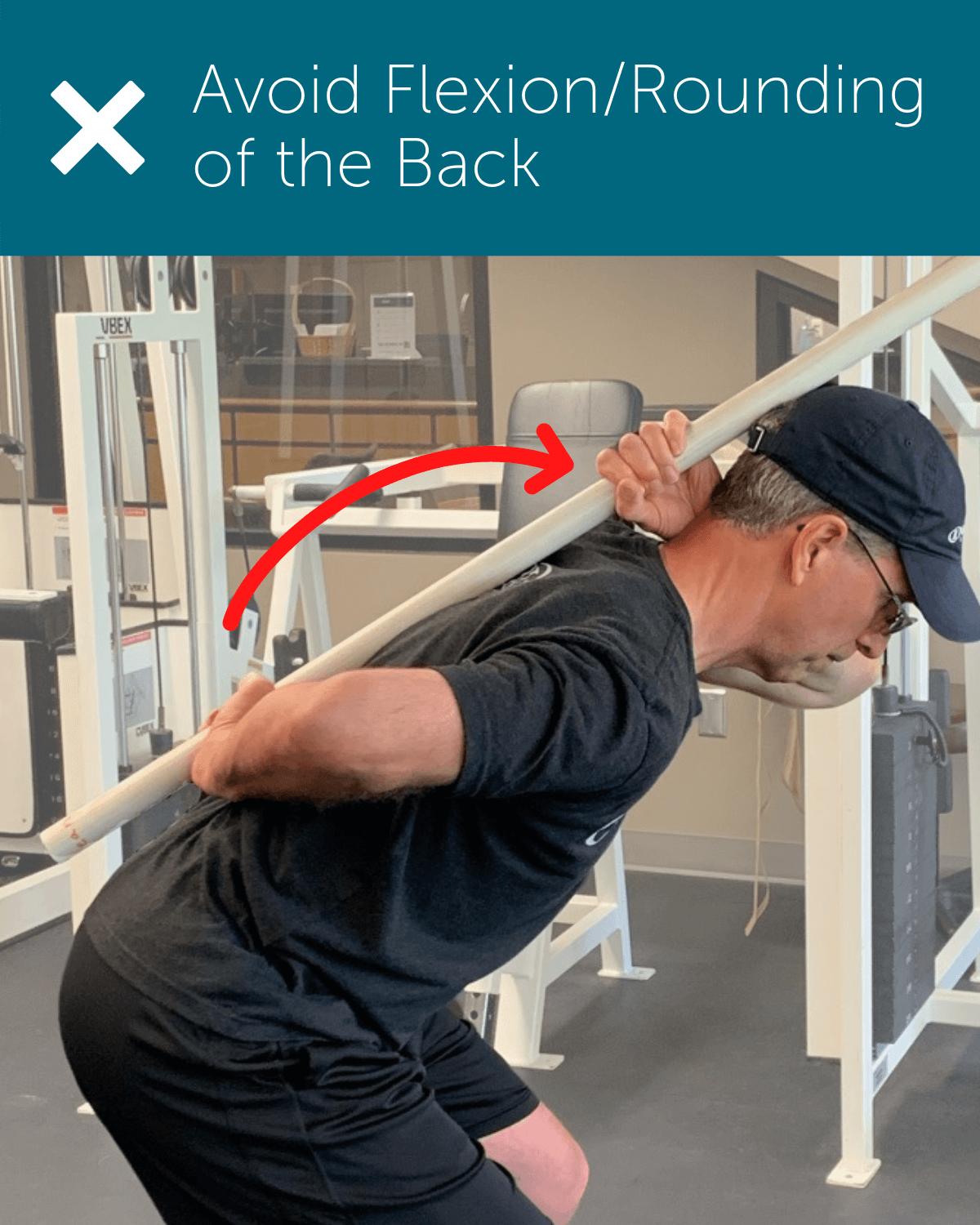 Orthopedic Institute Spine Therapist demonstrates lack of a neutral spine or flexion/rounding of the back.