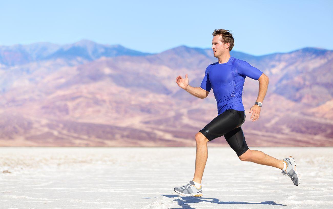 A person running with compression shorts.