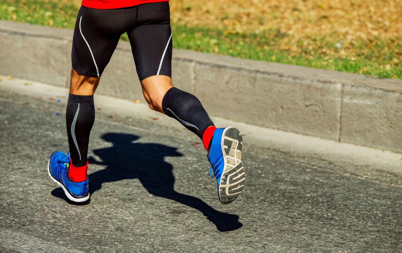 A person running with compression gear.