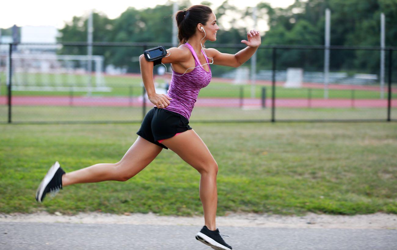 A person running on a track.