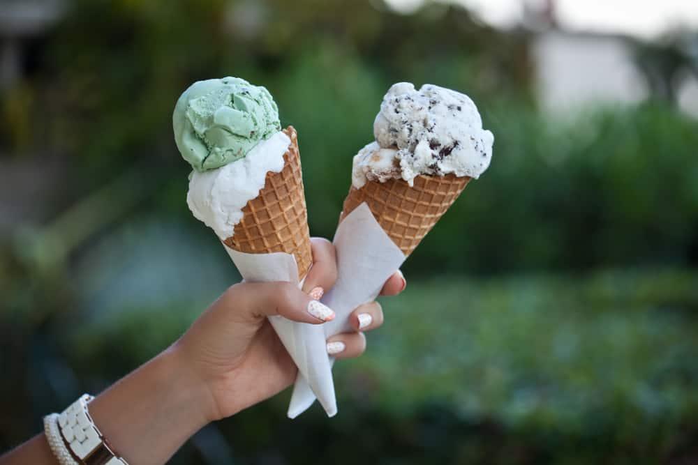 Hand holding an ice cream cones