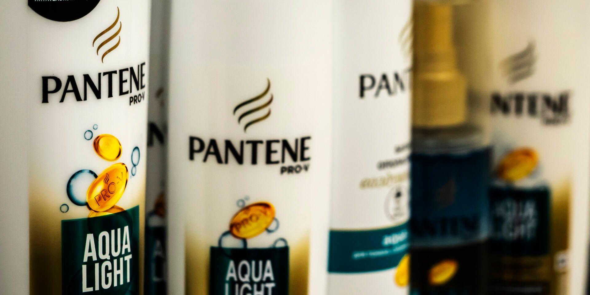 Bottles of Pantene shampoos and Pantene styling hair products