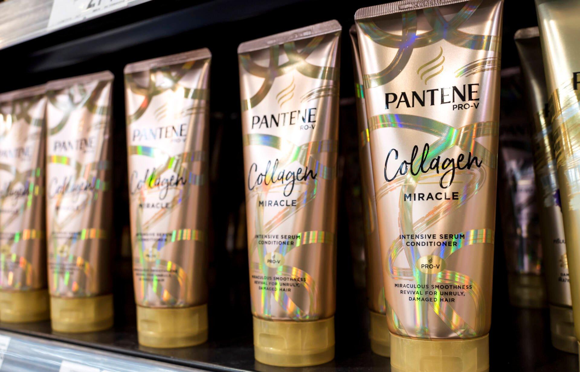 A shelf of Pantene haircare products in a beauty store