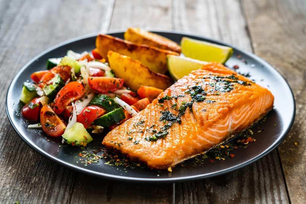 Fried salmon fillet with fried potatoes