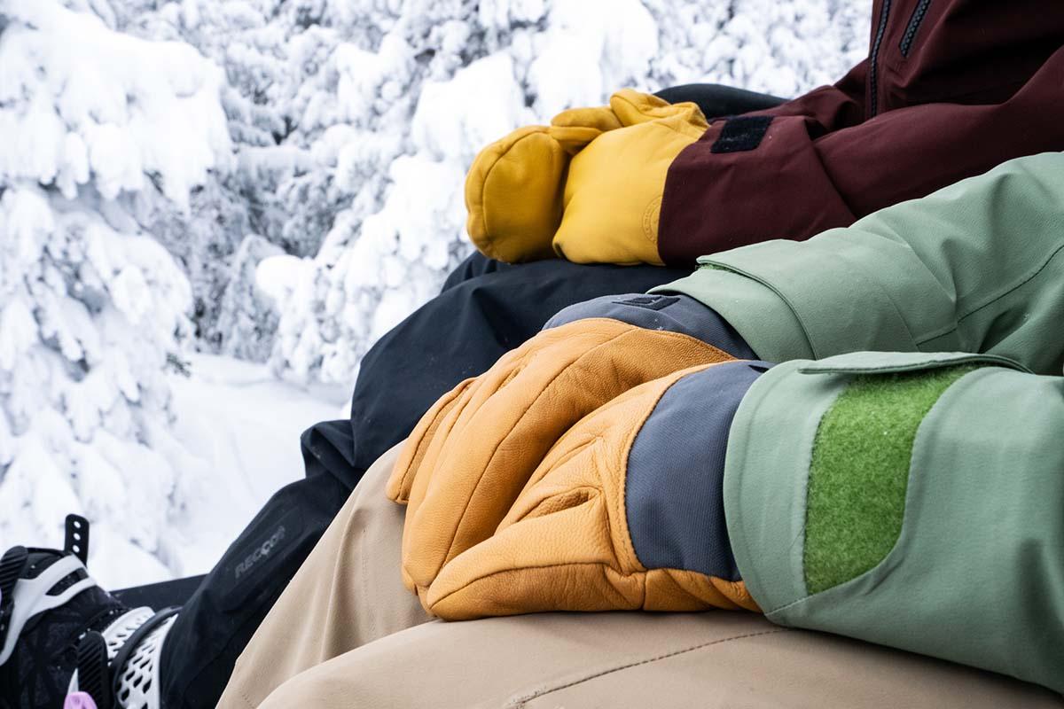 Leather snowboard glove and mittens (sitting on chairlift)