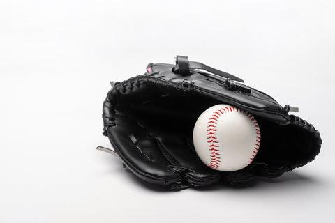 Close-up of a baseball glove showing mold growth