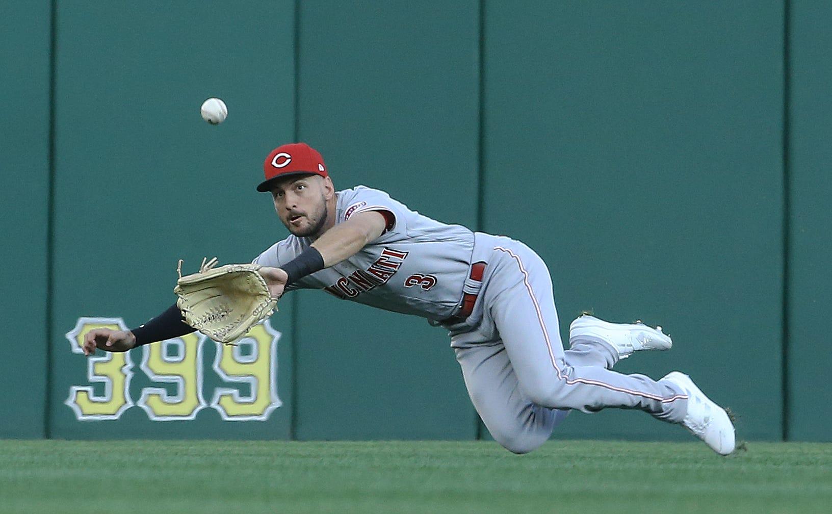 Aug 19, 2022; Pittsburgh, Pennsylvania, USA; Cincinnati Reds center fielder Albert Almora Jr. (3) makes a catch for an out on a ball hit by Pittsburgh Pirates second baseman Kevin Newman (not pictured) during the first inning at PNC Park. Mandatory Credit: Charles LeClaire-USA TODAY Sports