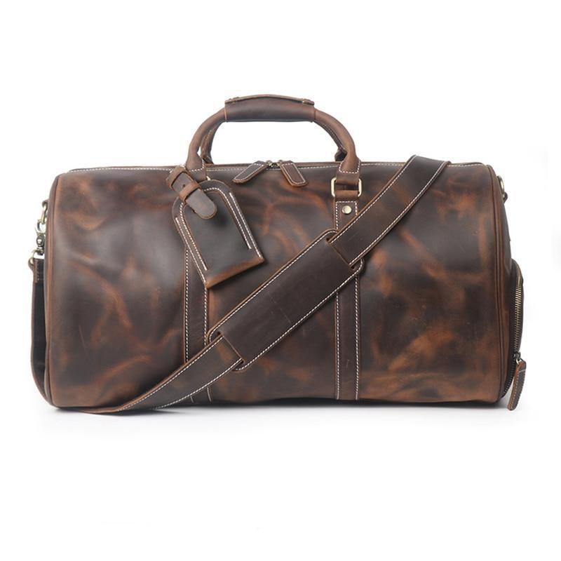 aged leather duffel bag