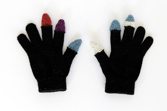 Easy DIY touch screen gloves made with conductive yarn thimbles! Click through for the free knitting and crochet patterns, plus a tutorial on how to assemble your gloves.