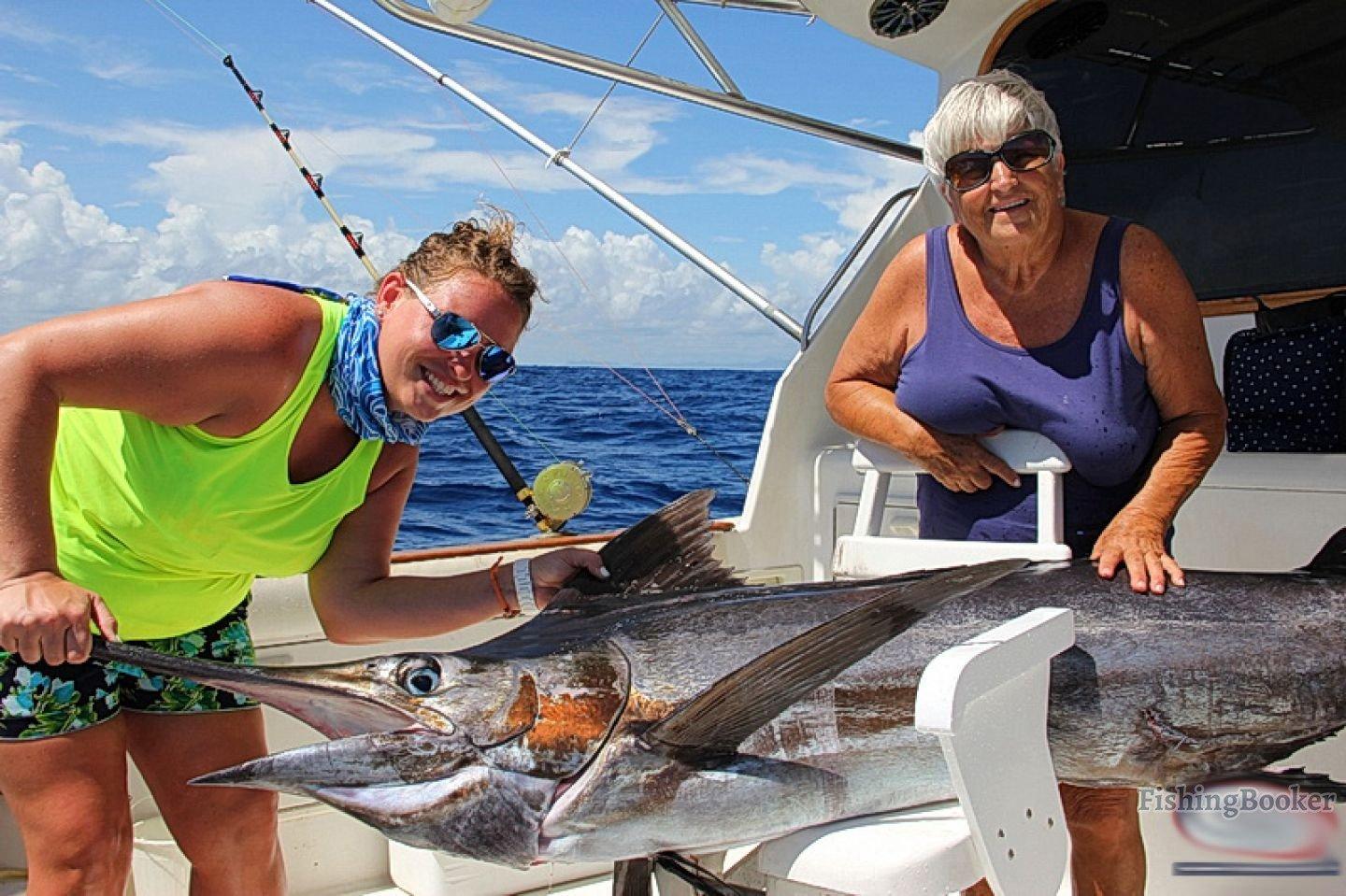 two ladies caught a marlin
