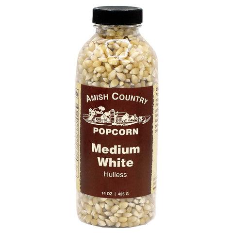 A bottle of Amish Country Popcorn Medium White Hulless popcorn