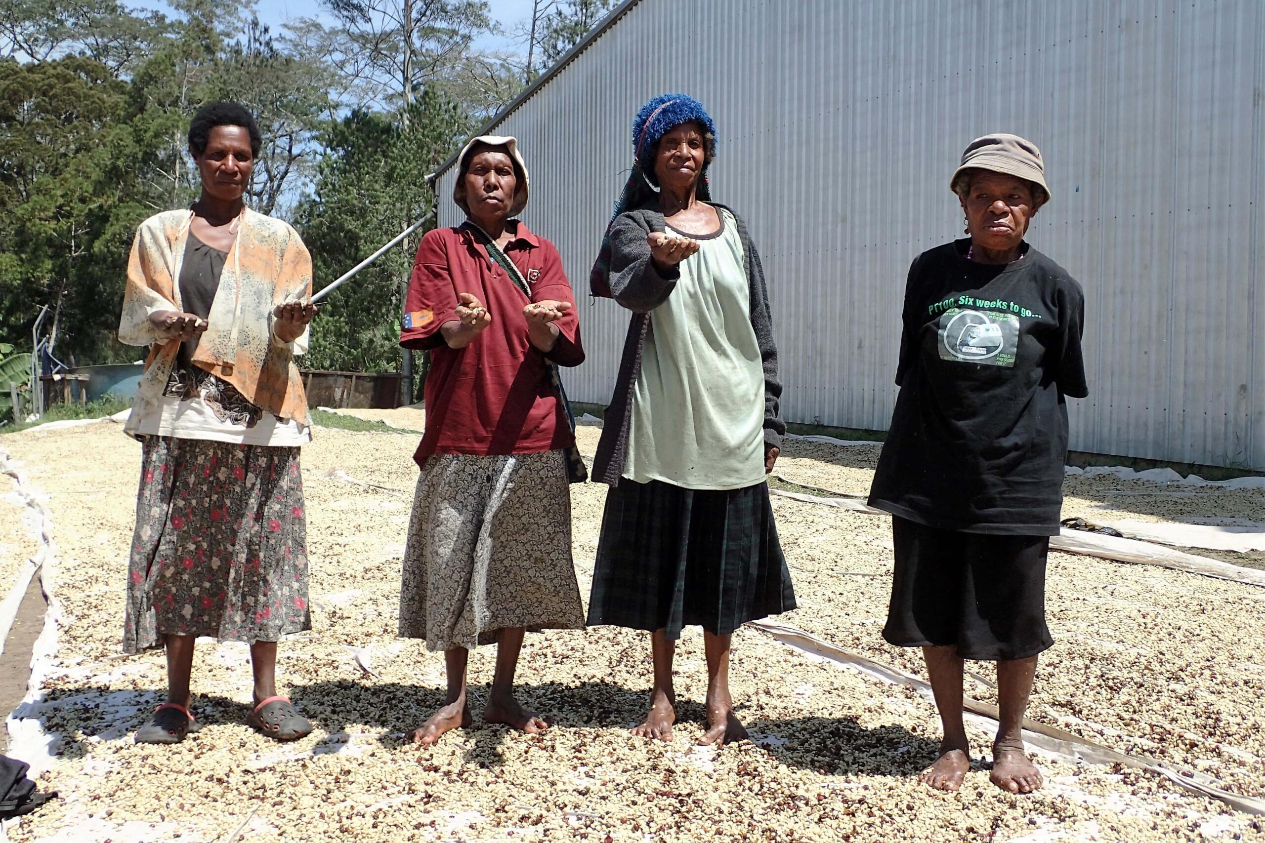 Ladies standing on and with green specialty coffee