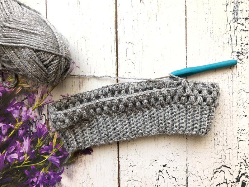 Crocheting with grey yarn (Photo by Merylove Art on Unsplash)