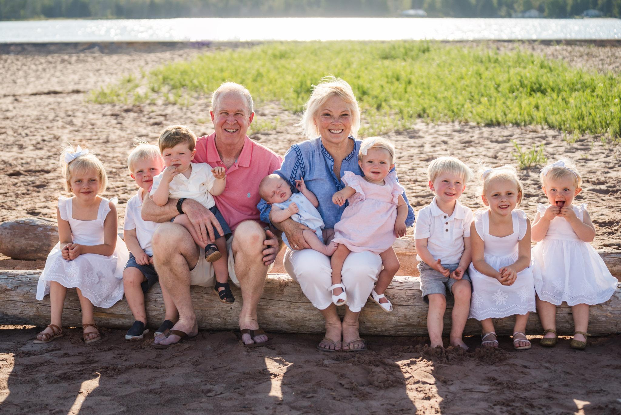 grandparents with grandchildren at white city beach