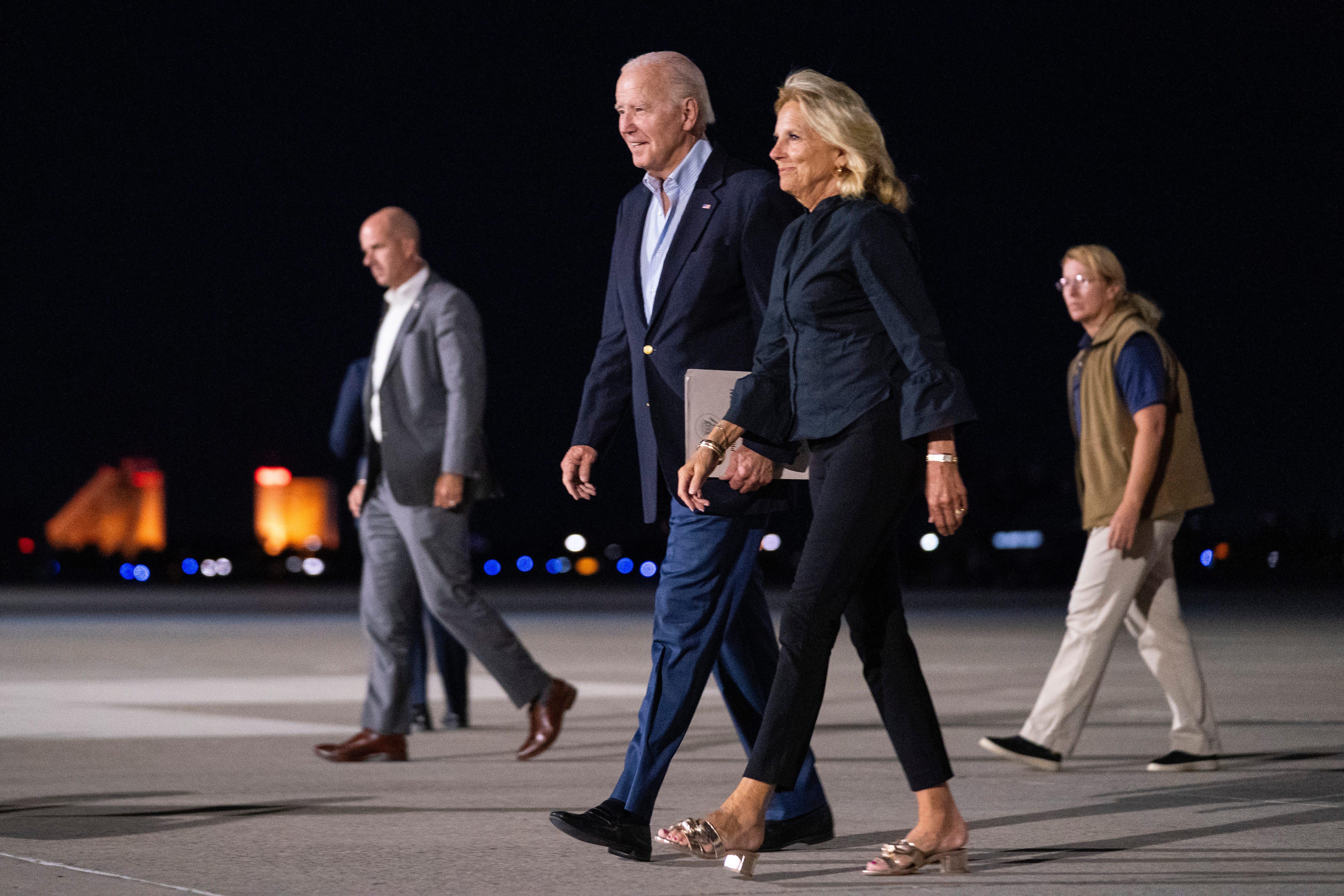 President Joe Biden and first lady Jill Biden arrive at Reno-Tahoe International Airport on Friday, Aug. 18, 2023, in Reno, Nev., for a vacation in the area. (AP Photo/Evan Vucci)