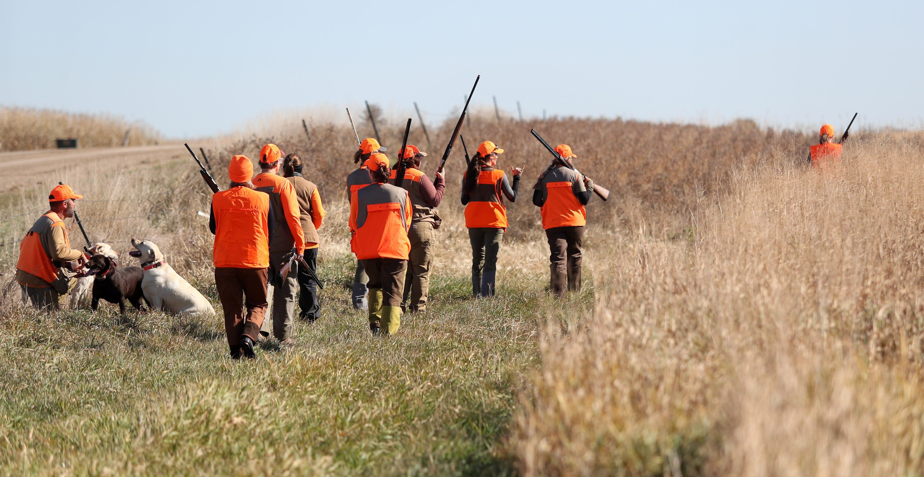 A group of female hunters approach a field near bath in 2019. The South Dakota pheasant hunting season opens Saturday.