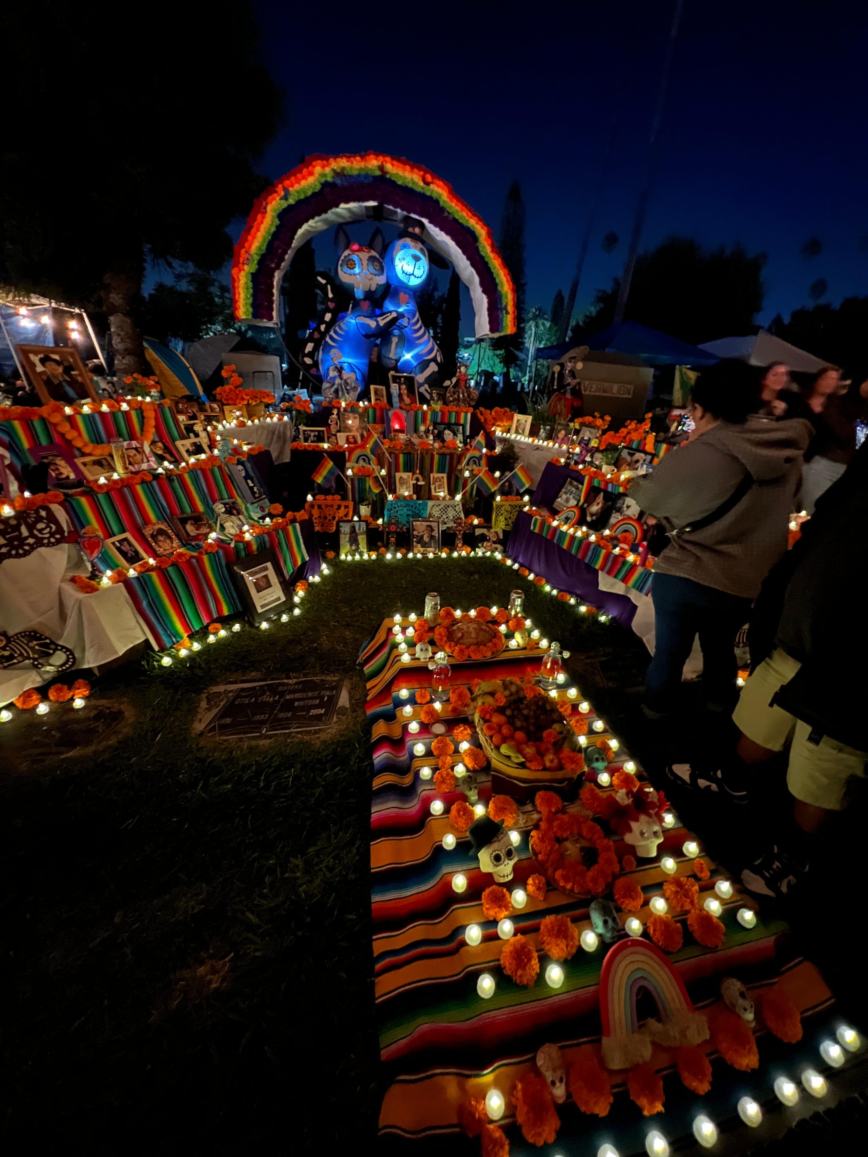 Pictures of dead pets and family members are displayed alongside candles and "ofrendas," or offerings, on an altar