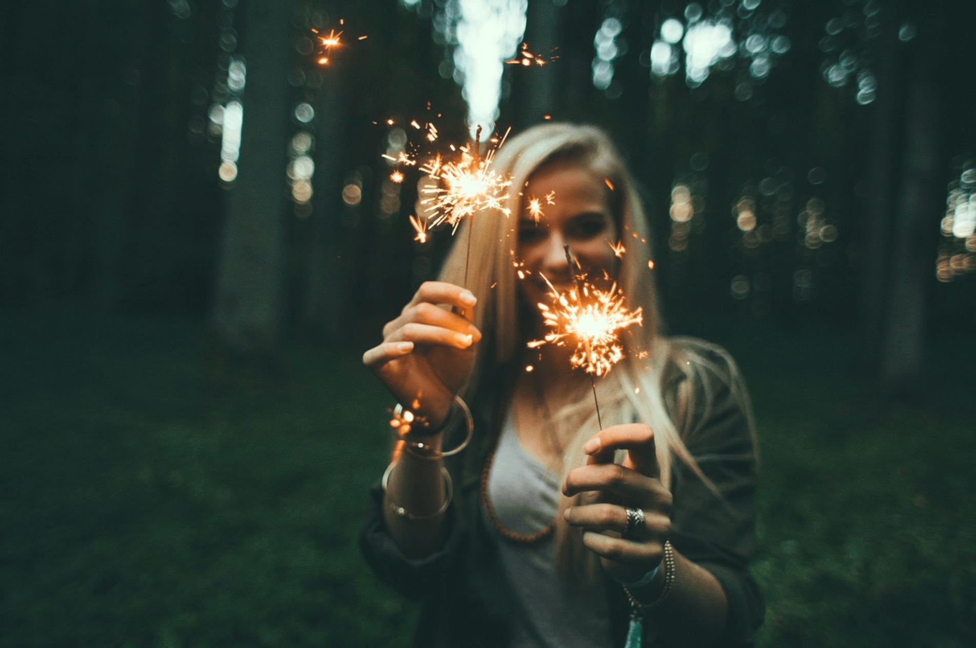 4th of July Orlando: image of girl holding sparklers outside