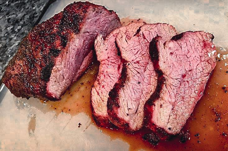 Photo of cooked and sliced tri-tip steak