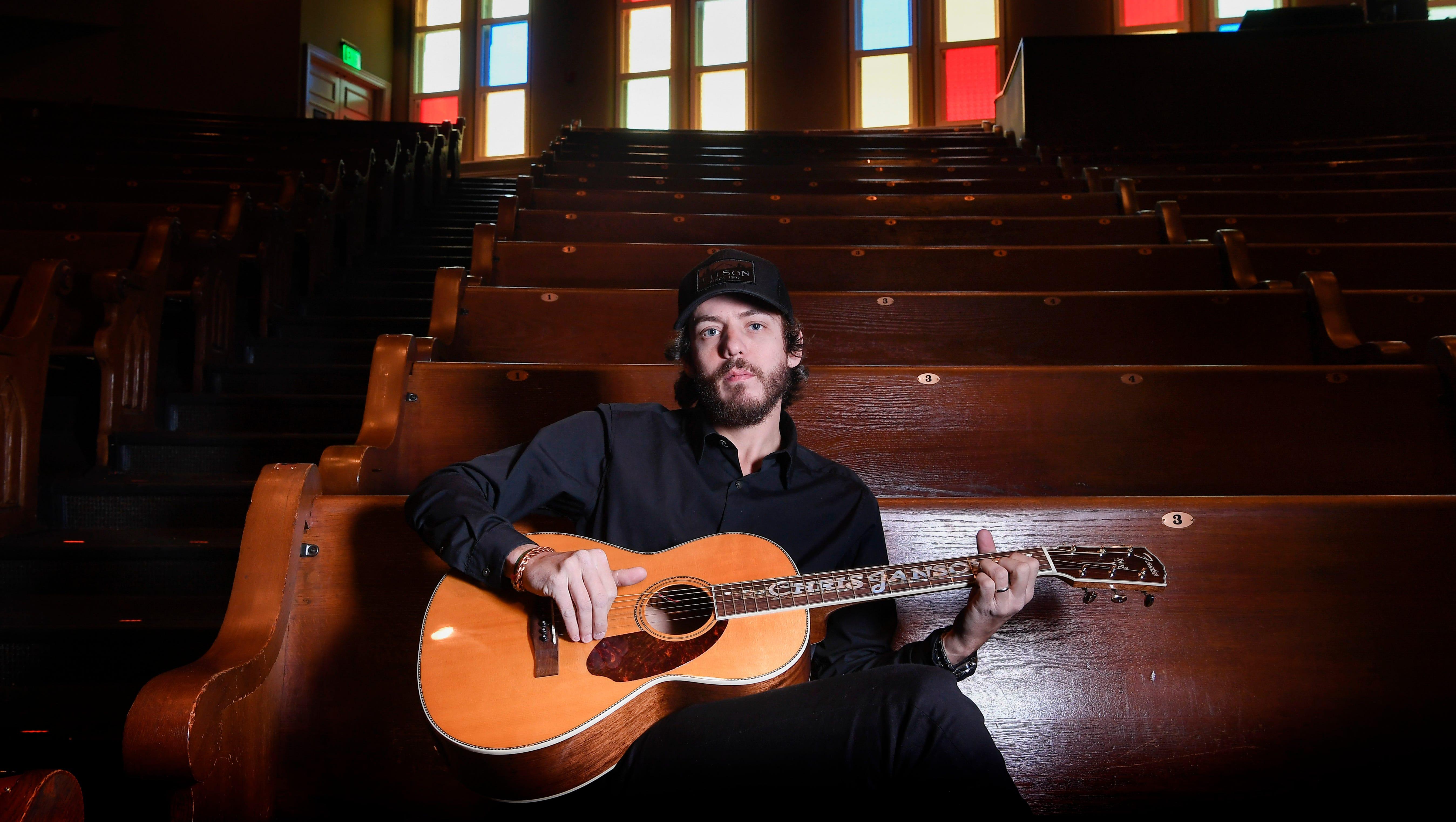 American singer songwriter Chris Janson plays as he poses for a portrait at the Ryman Auditorium in Nashville, Tenn., Tuesday, Jan. 23, 2018.