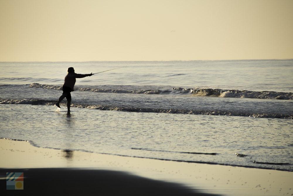 Casting a line on Sunset Beach