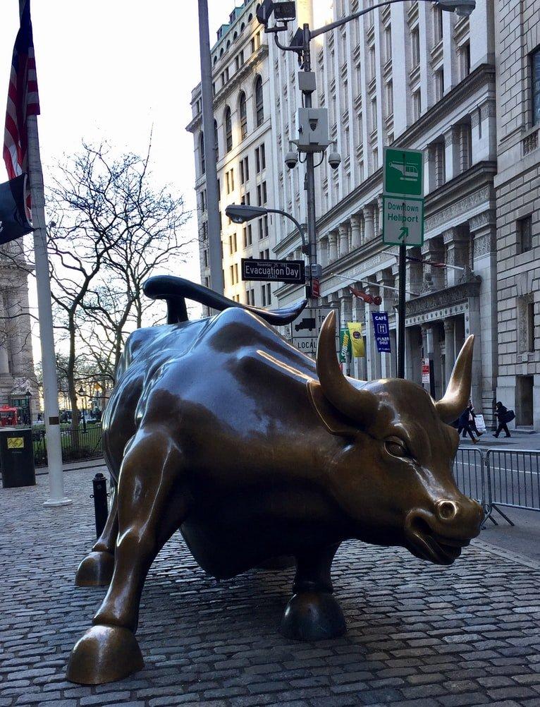 Tourists standing around the Charging Bull