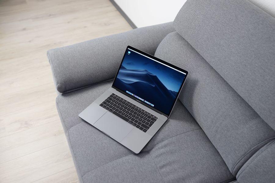 macbook pro on a couch