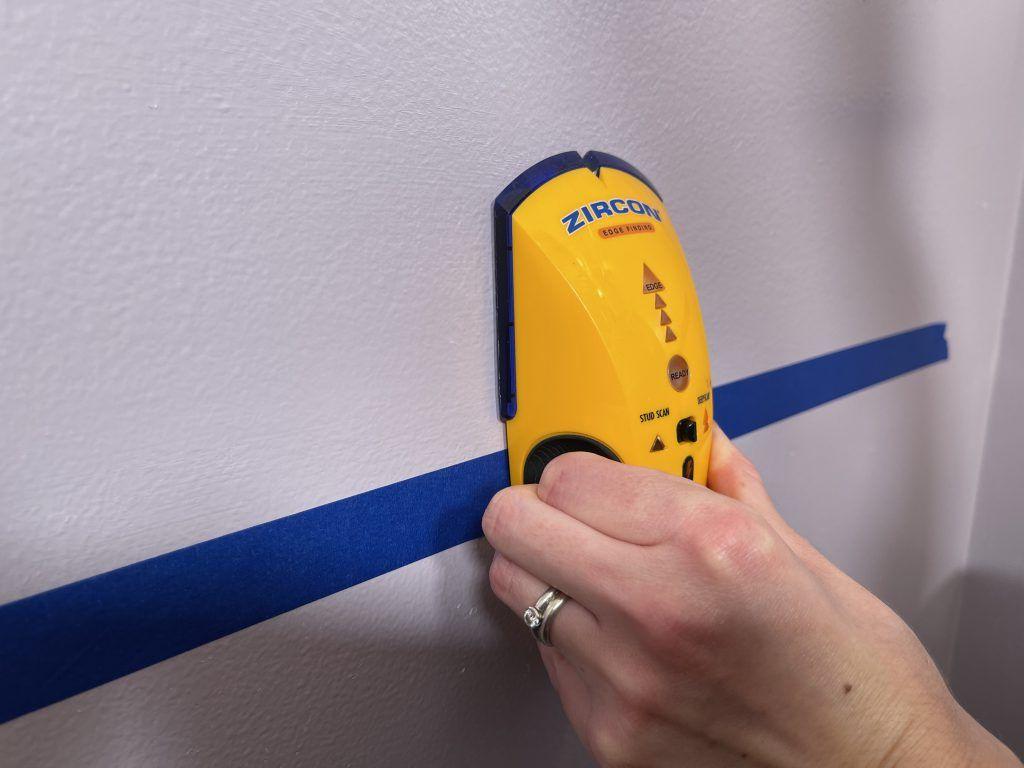 Toilet Grab Bar - Use stud-finder to locate wall studs for grab bar