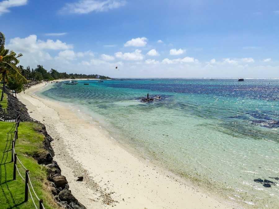 fisherman in the middle of the lagoon in front of Solana Beach Hotel in Mauritius