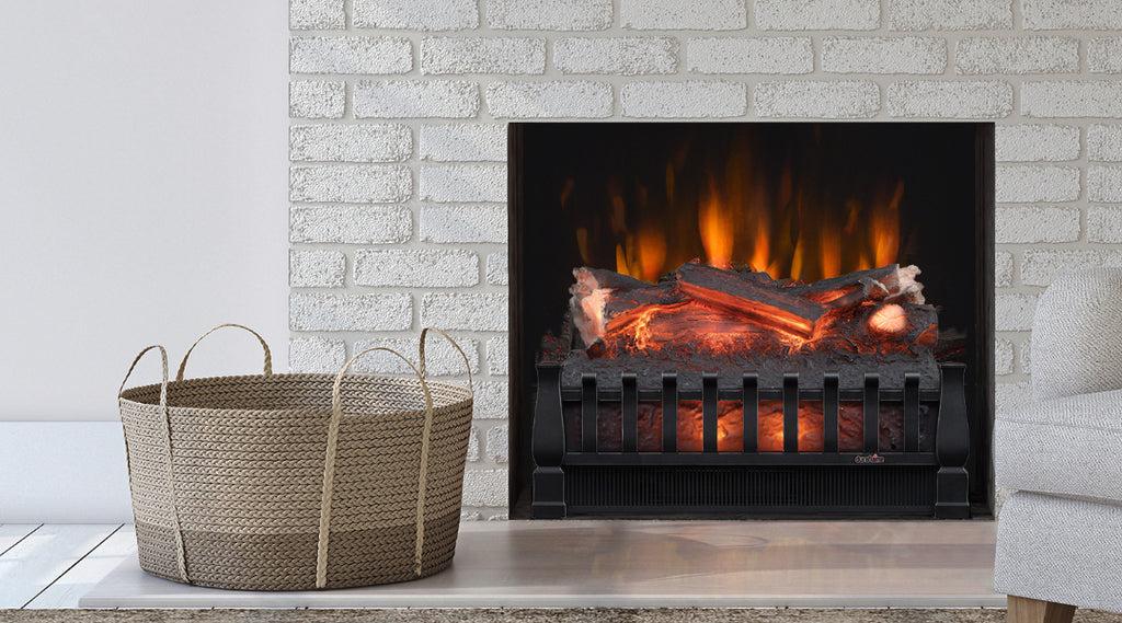 Electric fireplace insert with realistic flames installed in a brick surround.