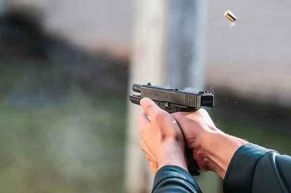 Man shooting glock pistol