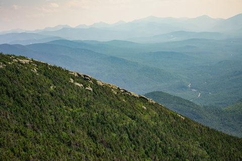 Trail peak overlook of Adirondacks Mountain range.