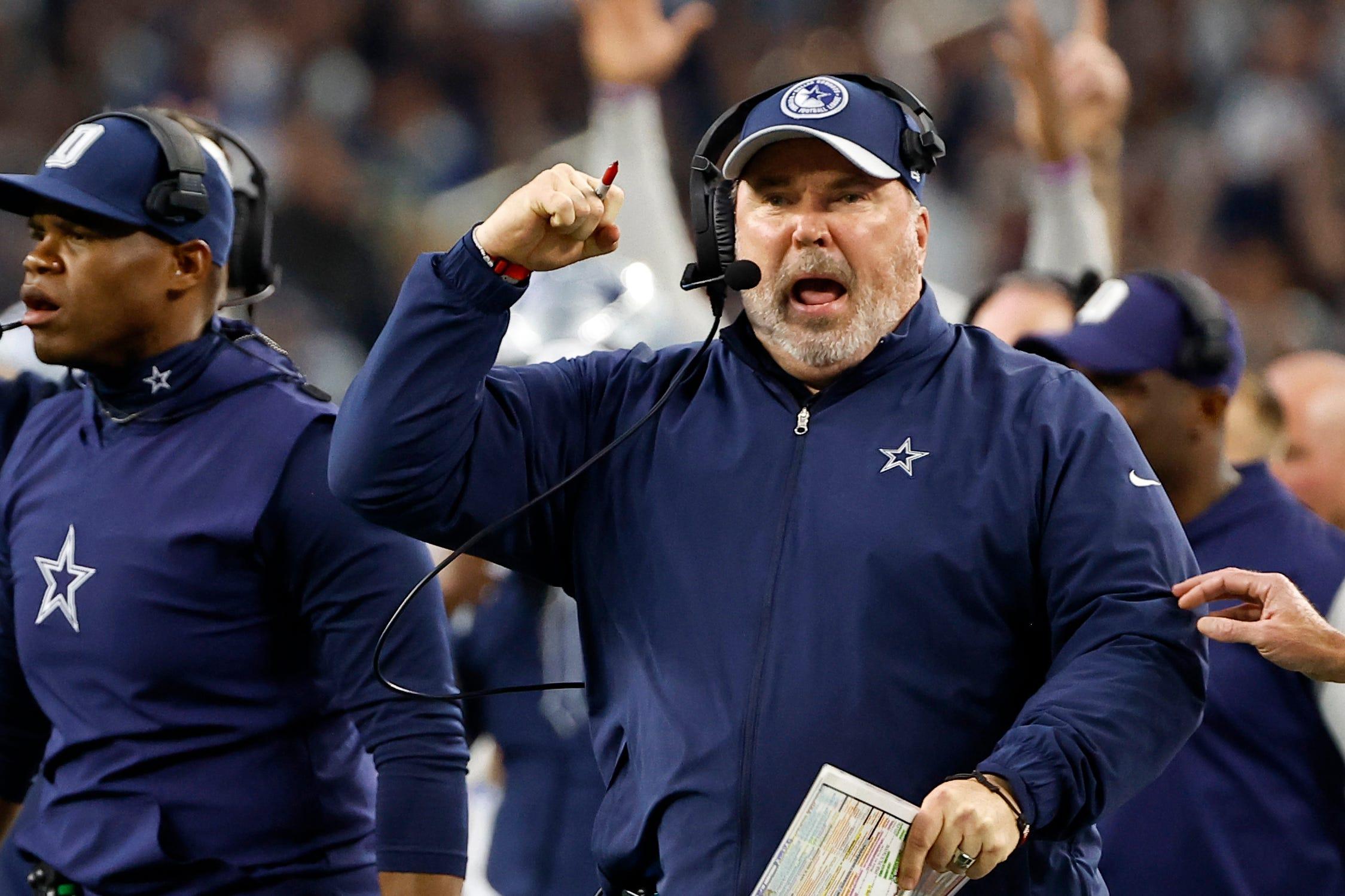 Dallas Cowboys head coach Mike McCarthy, celebrates after running back Tony Pollard ran the ball for a touchdown in the second half of an NFL football game against the Seattle Seahawks in Arlington, Texas, Thursday, Nov. 30, 2023.
