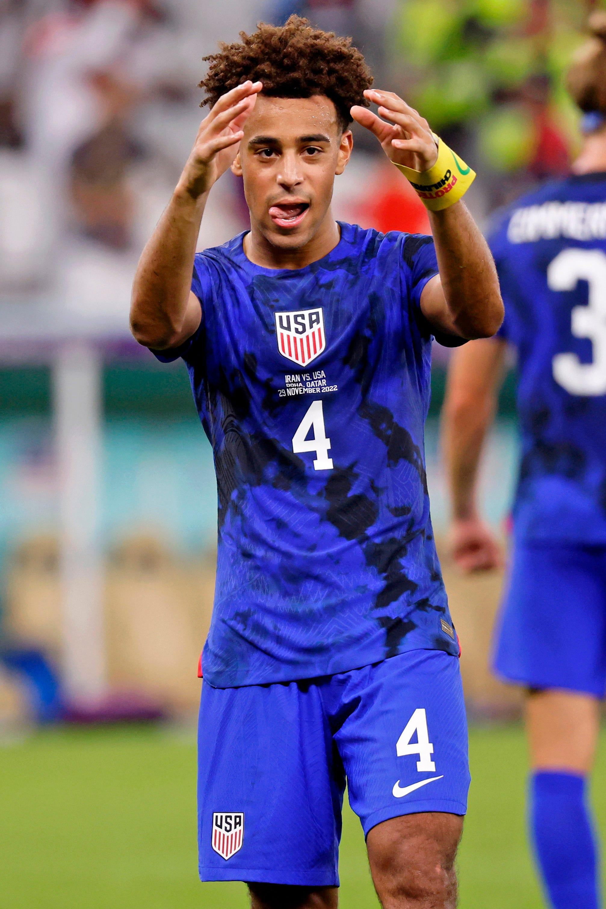 U.S. midfielder Tyler Adams, a Roy C. Ketcham High School graduate, celebrates after winning a group stage match against Iran to advance to the round of sixteen during the 2022 World Cup at Al Thumama Stadium in Doha, Qatar Tuesday.