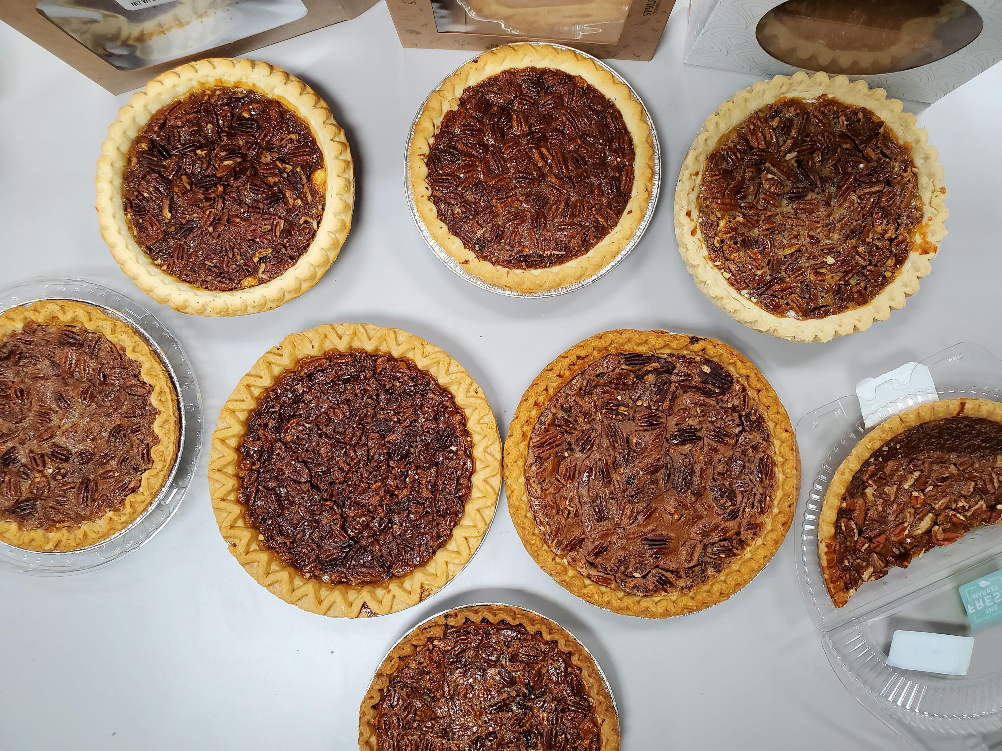 The eight pecan pies sampled as part of the judging. Left to right: Harris Teeter, Walmart, Marie Callender