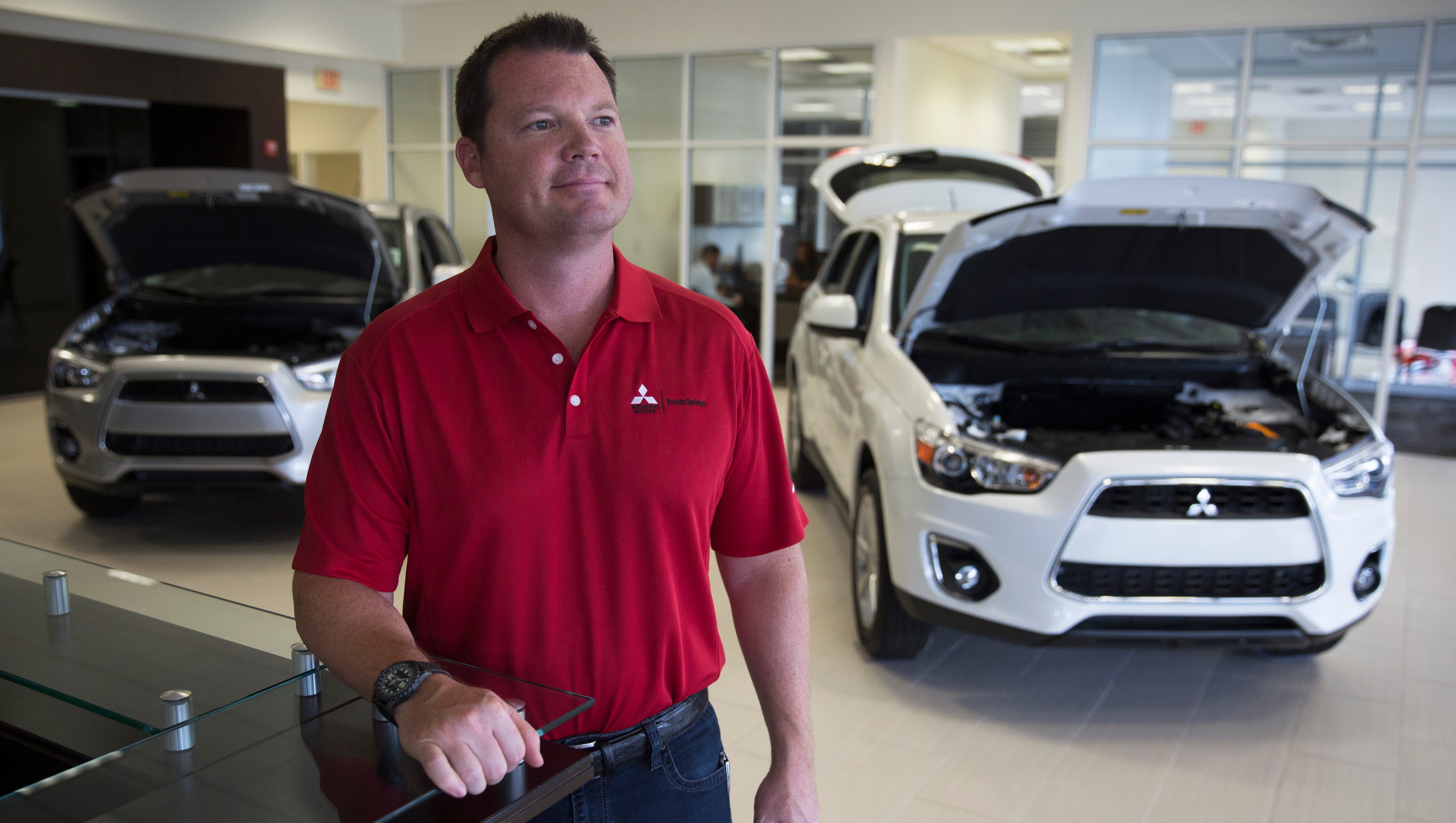 Co-owner Jeff Johnson poses for a portrait in the new Mitsubishi showroom on July 14, 2016, in Bonita Springs. Opening last weekend, the Naples-Bonita Springs area provides a great and competitive market for this new Mitsubishi car dealership.