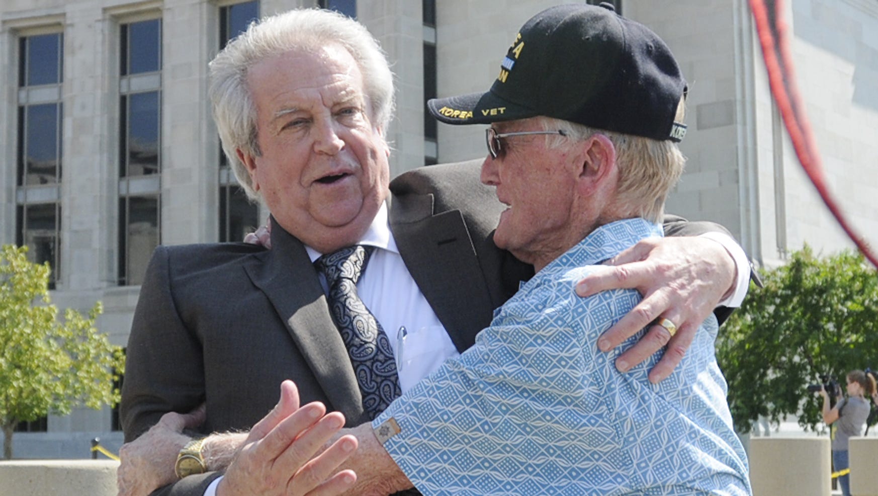 Milton McGregor is hugged by a supporter following the reading of the verdicts in the gambling corruption trial at the Federal Courthouse in Montgomery, Ala. on Thursday August 11, 2011. (Montgomery Advertiser, Mickey Welsh)