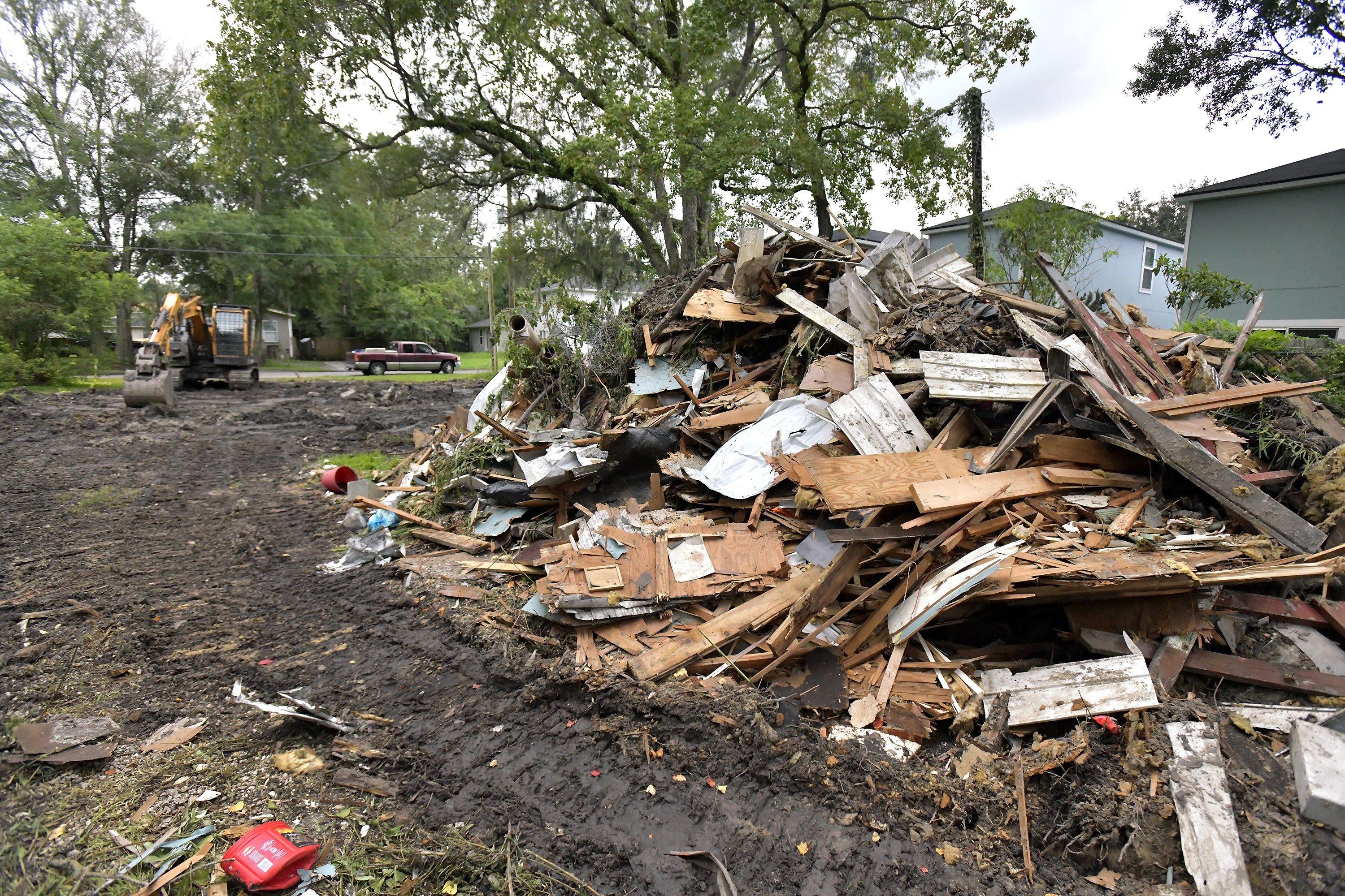 Debris from a couple of trailers that were on the property behind the Woodcrest Grocery wait to be cleared after the historic Lynyrd Skynyrd site was demolished. A few muddy cinderblocks are all that remain on the site of the Woodcrest Grocery.