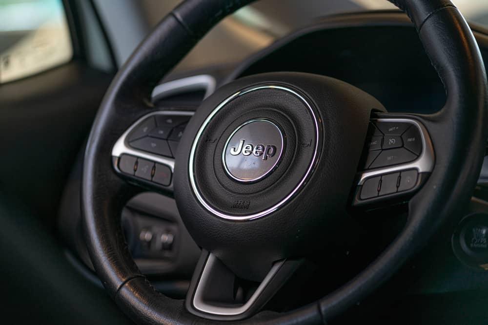 View of Jeep Logo on Car Steering Wheel