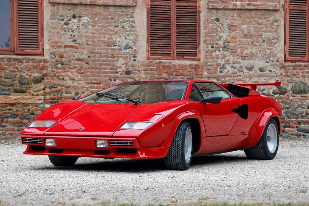 Lamborghini Countach , front view with old house background