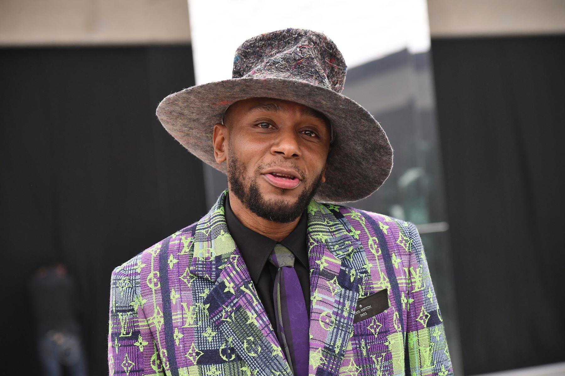 Mos Def (formerly Yasiin Bey) posing during the Louis Vuitton Menswear portion of Paris Fashion Week